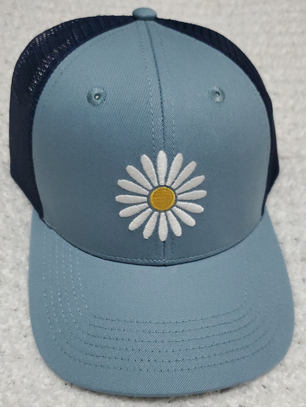 Life Is Good Blue Tagged Trucker Hat - Daisy